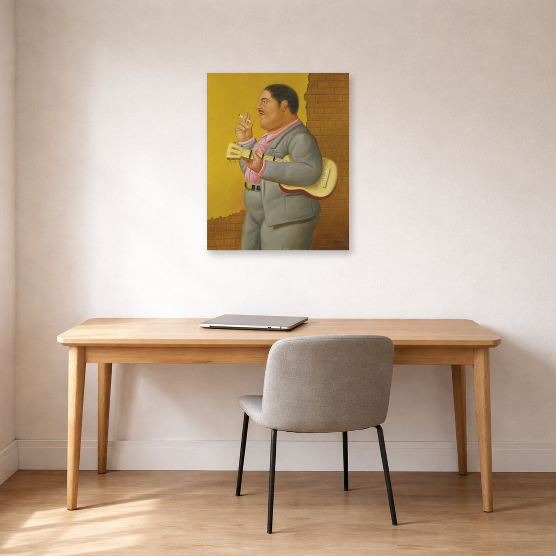 Unframed poster print of Fernando Botero's Man with Banjo displayed on a wall in a home office