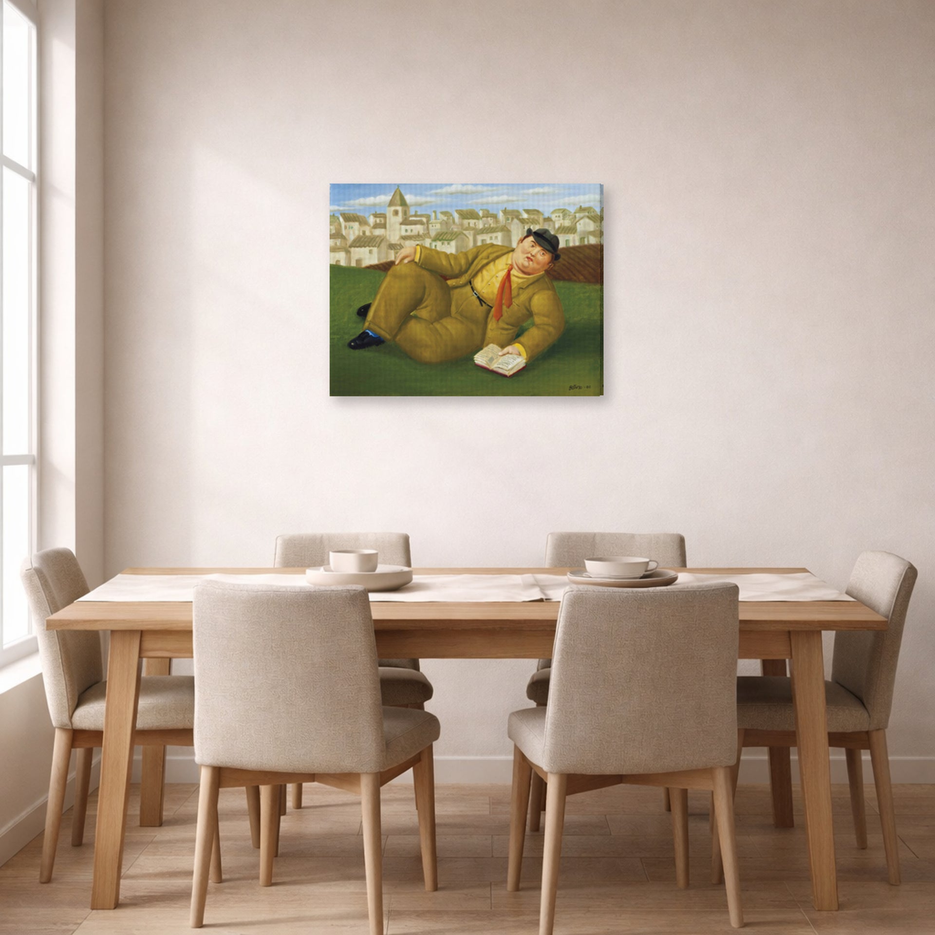 Gallery-wrapped canvas print of Fernando Botero's Man with Book displayed on a wall in a dining room