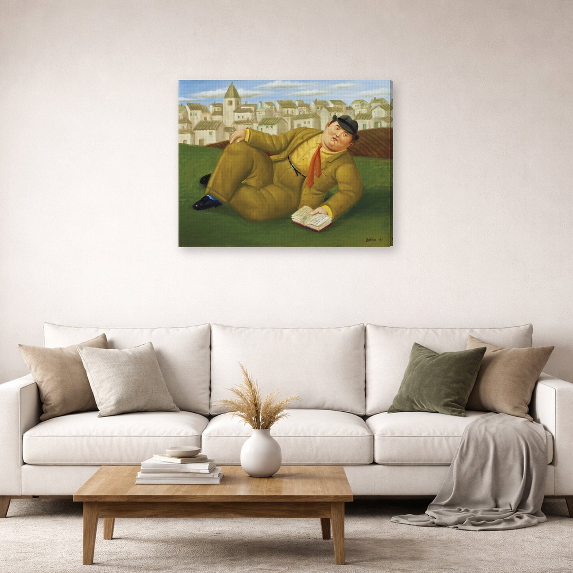 Gallery-wrapped canvas print of Fernando Botero's Man with Book displayed on a wall in a living room
