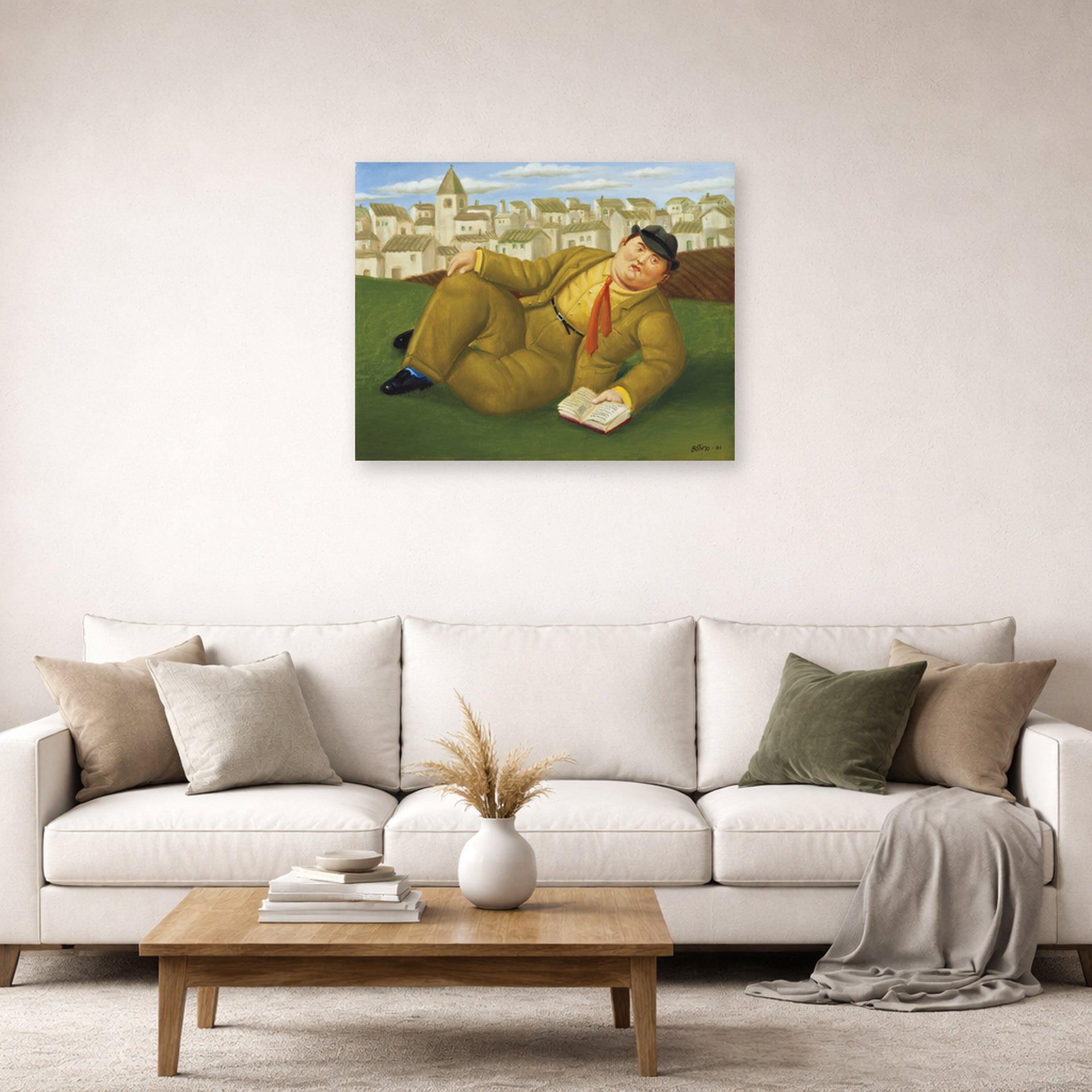 Unframed poster print of Fernando Botero's Man with Book displayed on a wall in a living room