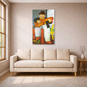 Gallery-wrapped canvas print of Fernando Botero's Man with a Guitar displayed on a wall in a living room