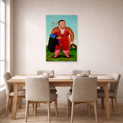 Unframed poster print of Fernando Botero's Matador displayed on a wall in a dining room