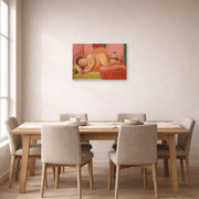 Unframed poster print of Fernando Botero's Naked Laying displayed on a wall in a dining room