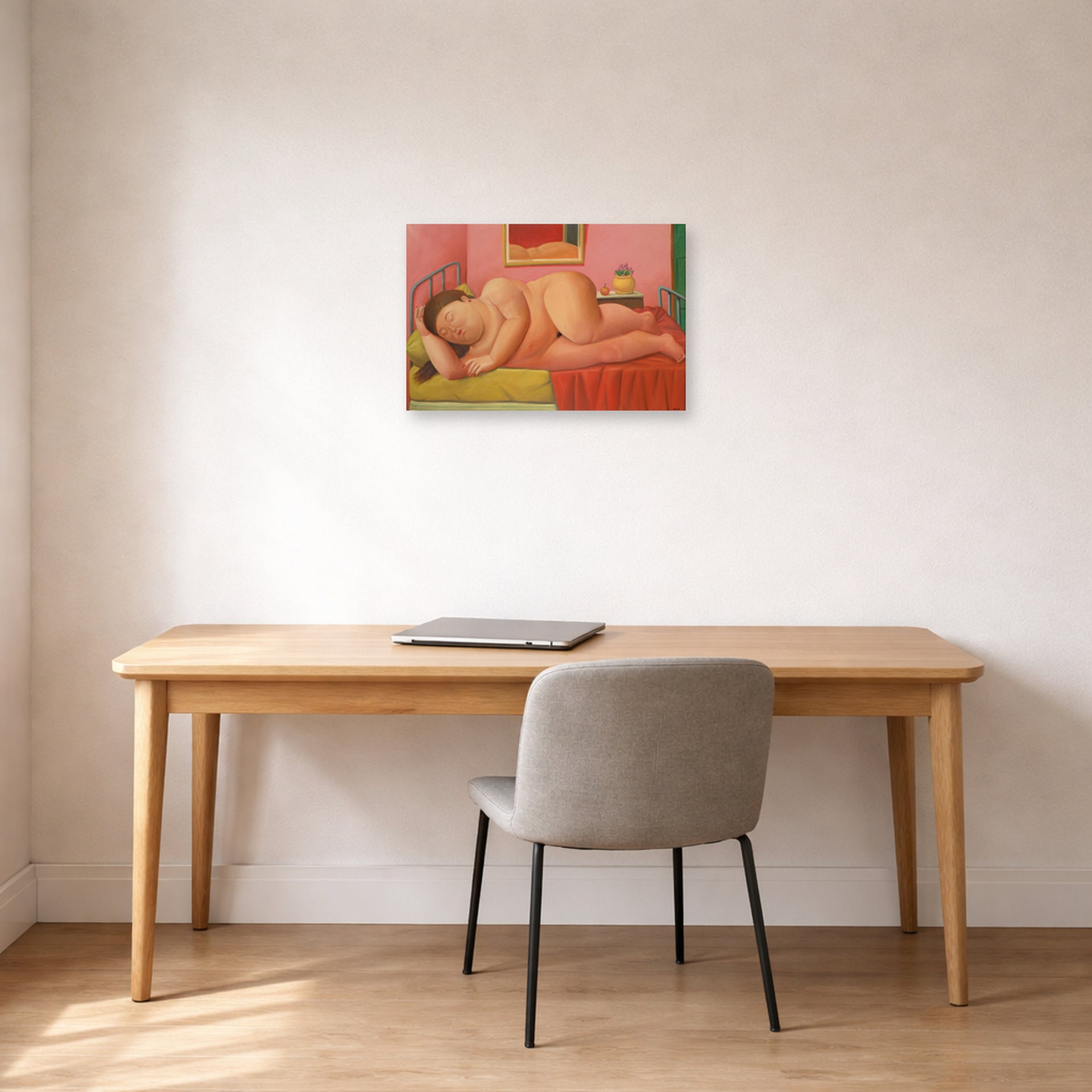 Unframed poster print of Fernando Botero's Naked Laying displayed on a wall in a home office