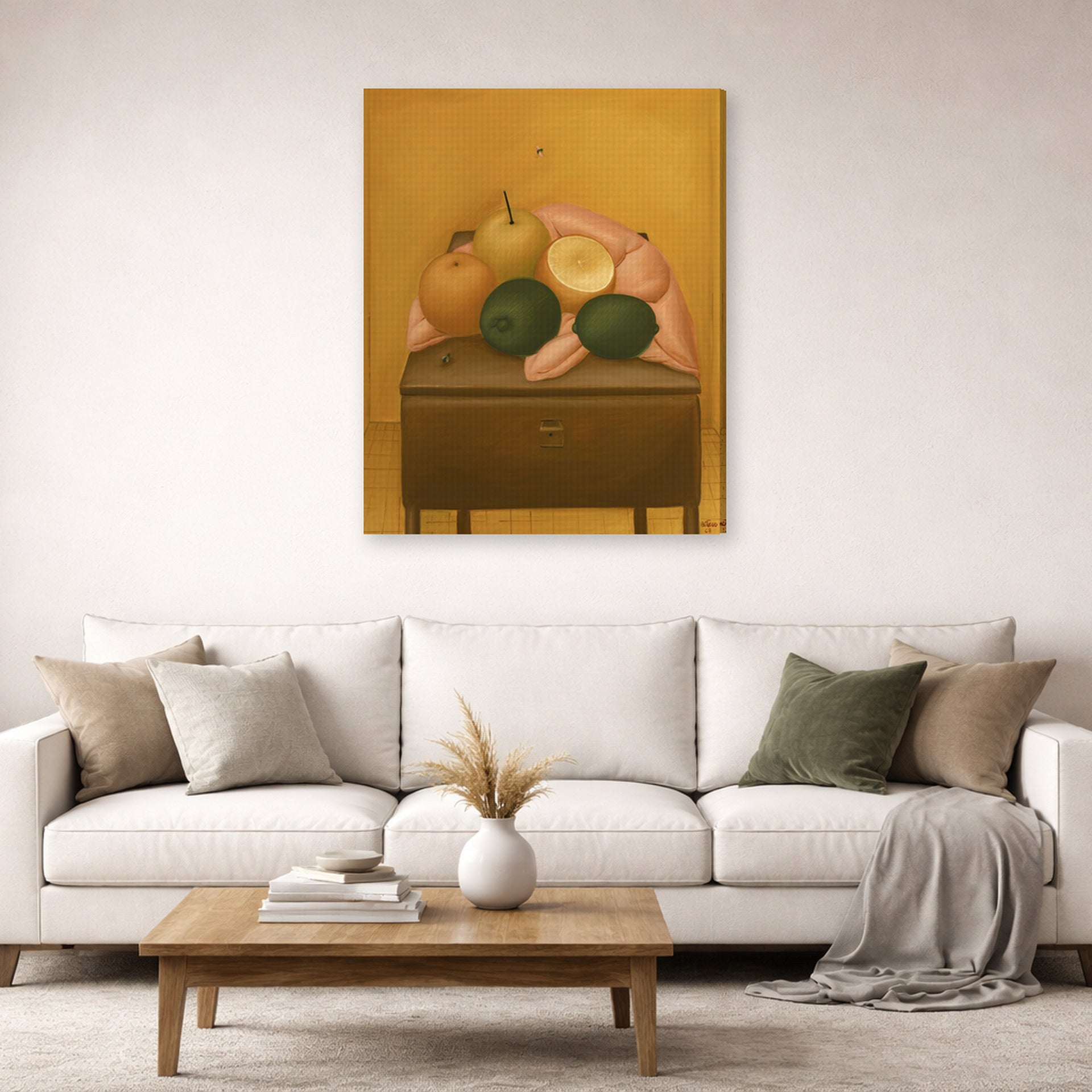 Gallery-wrapped canvas print of Fernando Botero's Naranjas Y Limones displayed on a wall in a living room