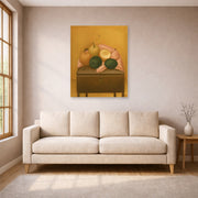 Unframed poster print of Fernando Botero's Naranjas Y Limones displayed on a wall in a living room