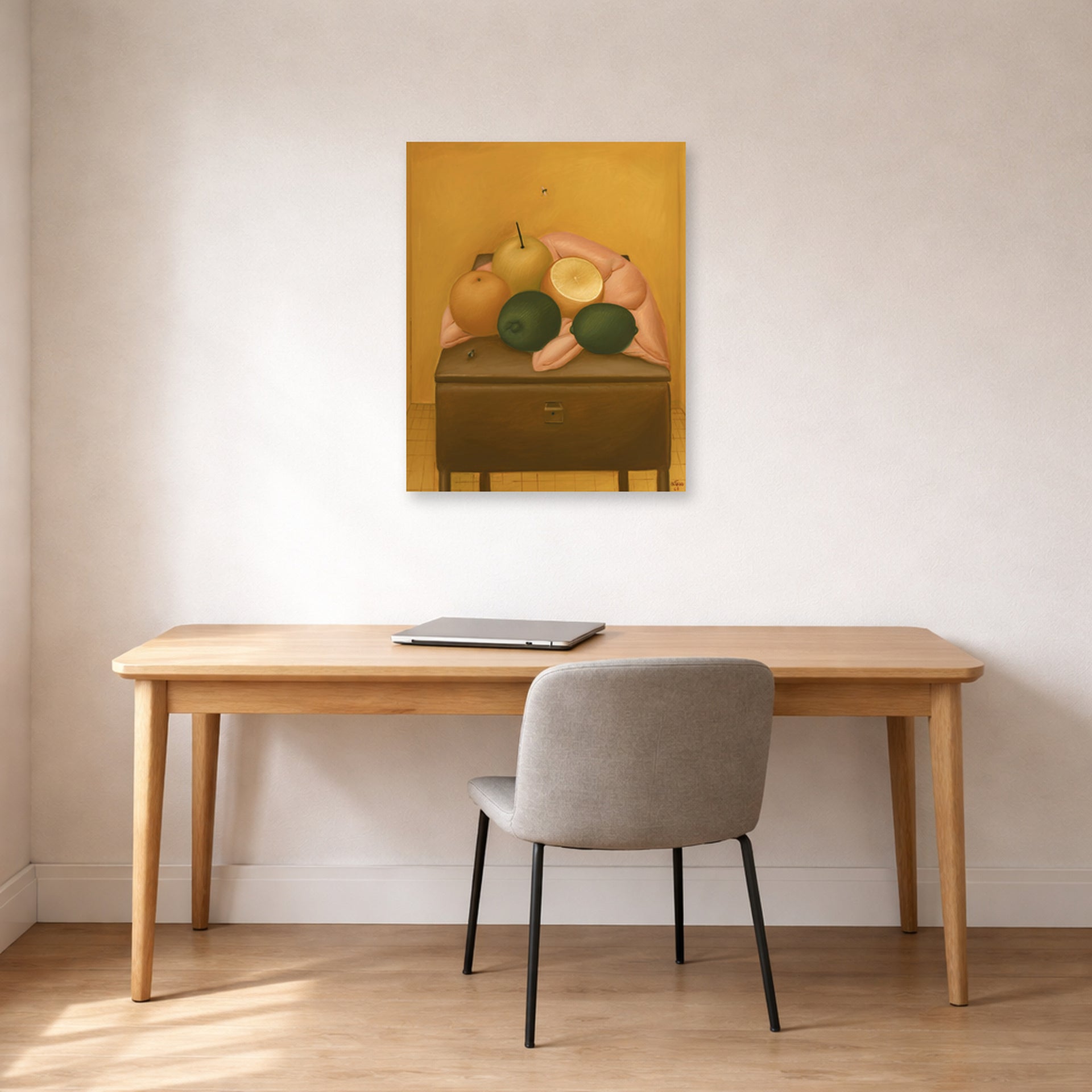 Unframed poster print of Fernando Botero's Naranjas Y Limones displayed on a wall in a home office