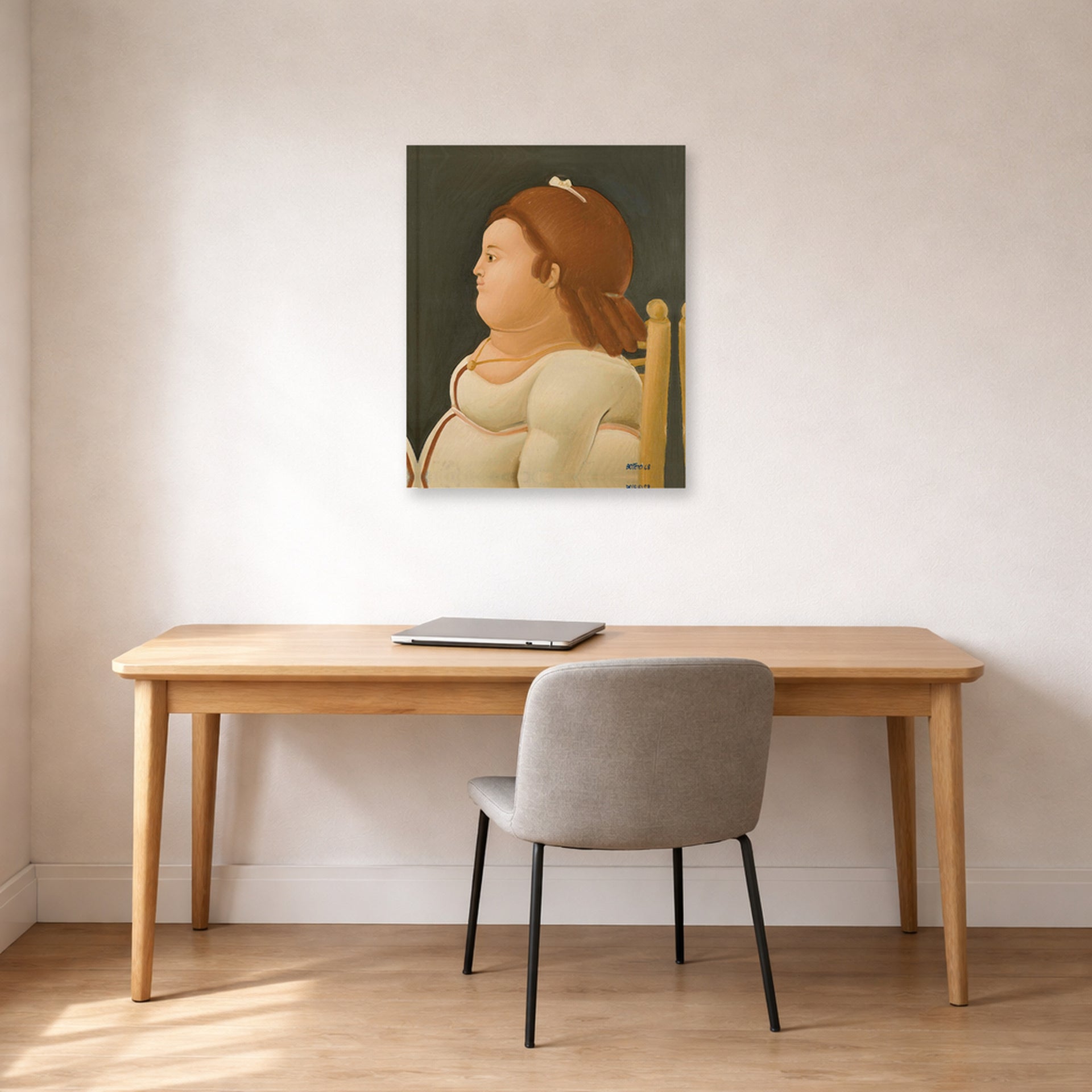 Unframed poster print of Fernando Botero's Perfil De Dama displayed on a wall in a home office