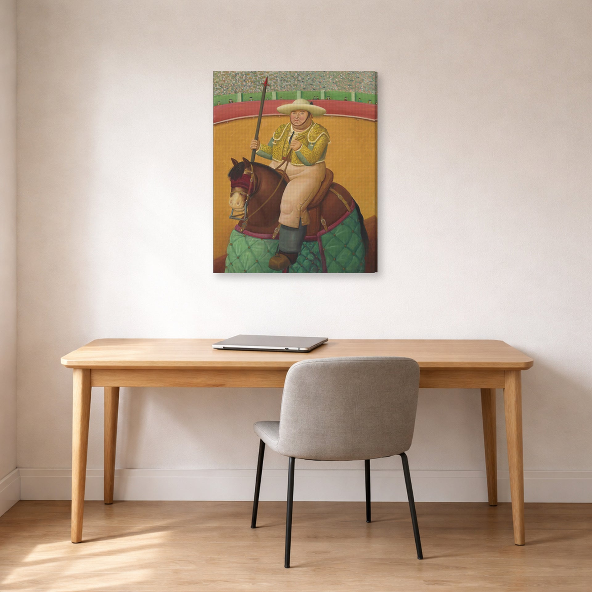 Gallery-wrapped canvas print of Fernando Botero's Picador displayed on a wall in a home office