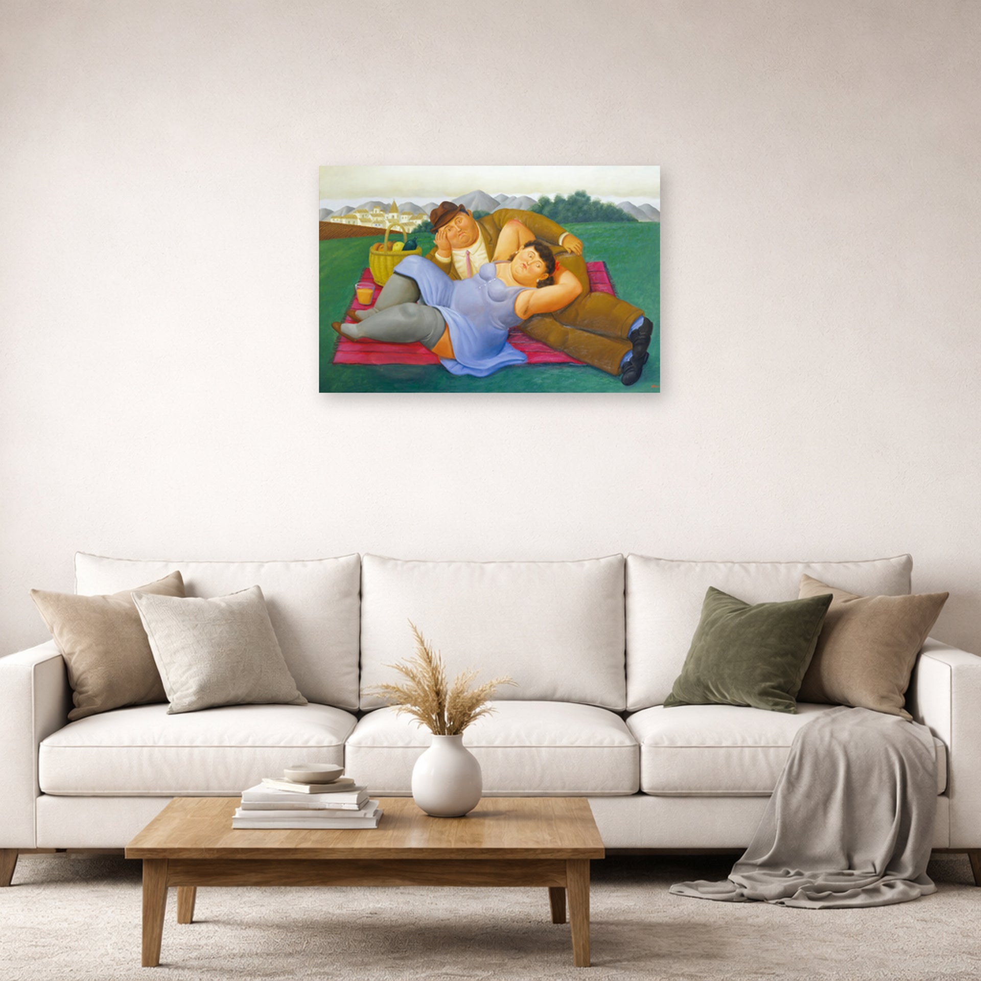 Unframed poster print of Fernando Botero's Picnic displayed on a wall in a living room