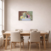 Unframed poster print of Fernando Botero's Still Life with Cake displayed on a wall in a dining room