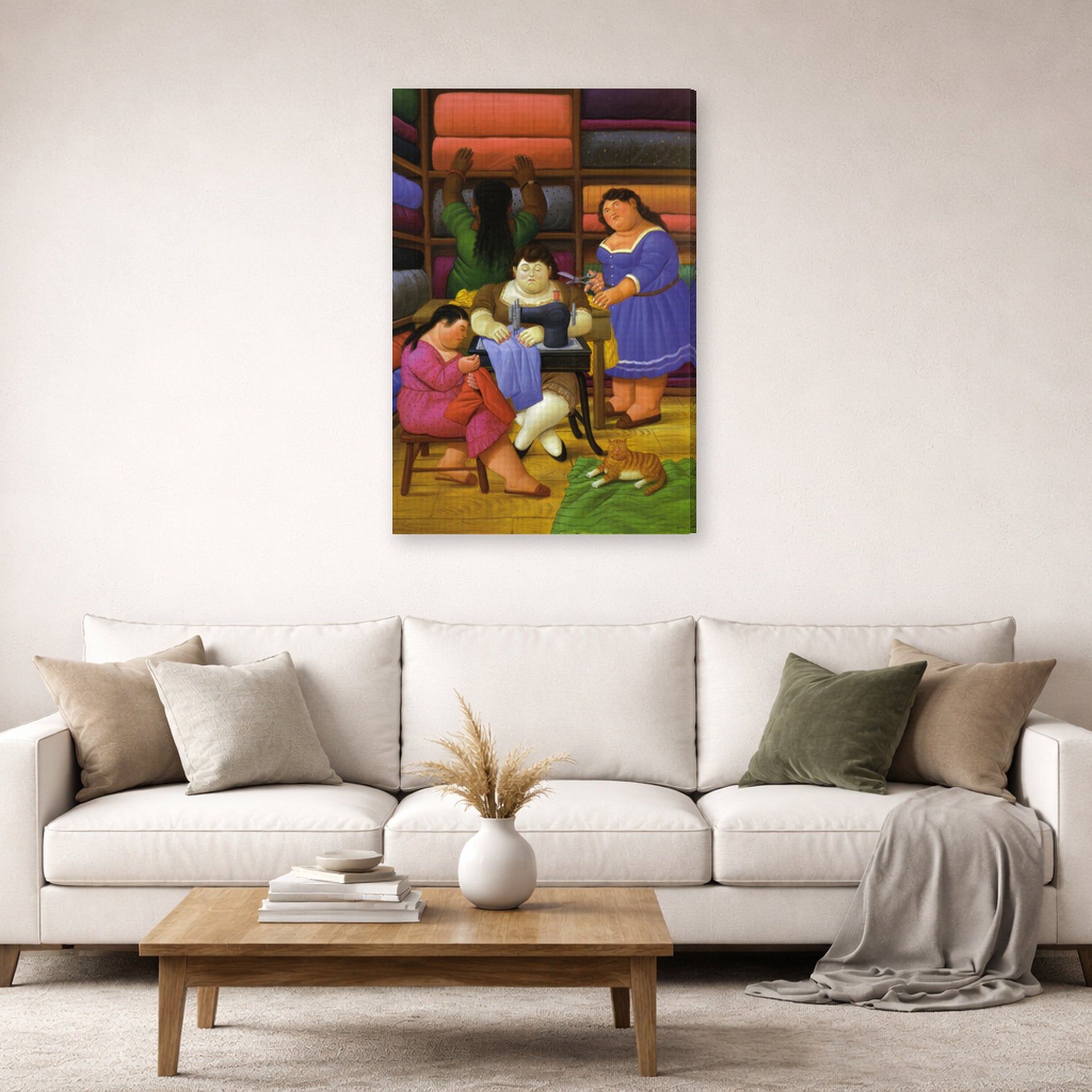 Gallery-wrapped canvas print of Fernando Botero's The Designers displayed on a wall in a living room