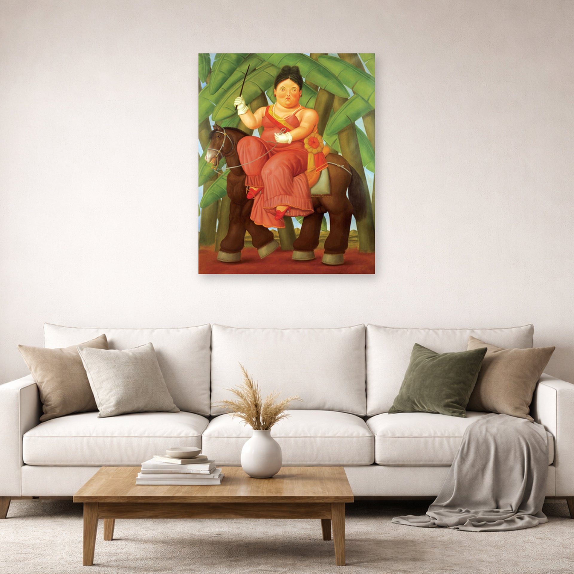 Unframed poster print of Fernando Botero's The First displayed on a wall in a living room