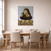 Gallery-wrapped canvas print of Fernando Botero's Tour of the Volcano displayed on a wall in a dining room