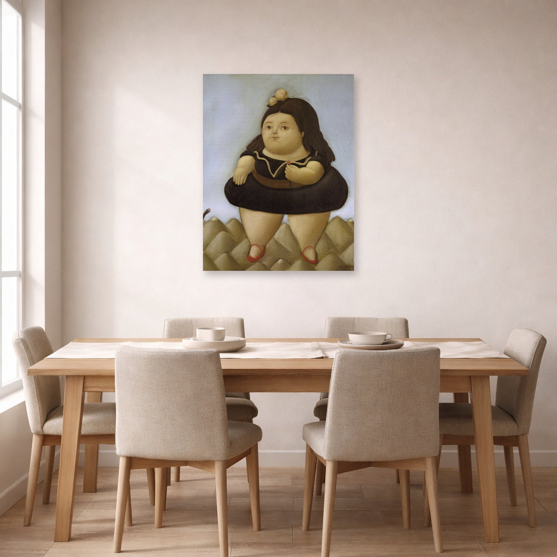 Unframed poster print of Fernando Botero's Tour of the Volcano displayed on a wall in a dining room