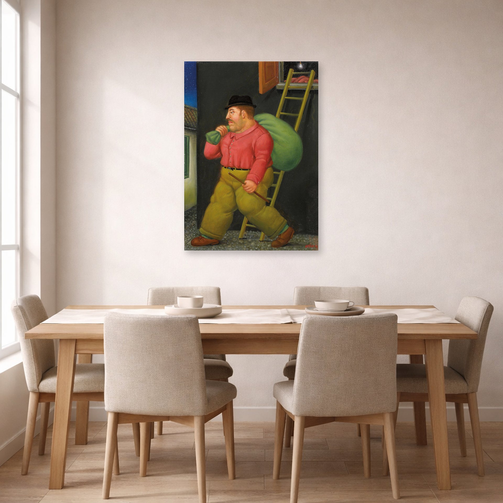 Unframed poster print of Fernando Botero's Un ladron (A thief) displayed on a wall in a dining room