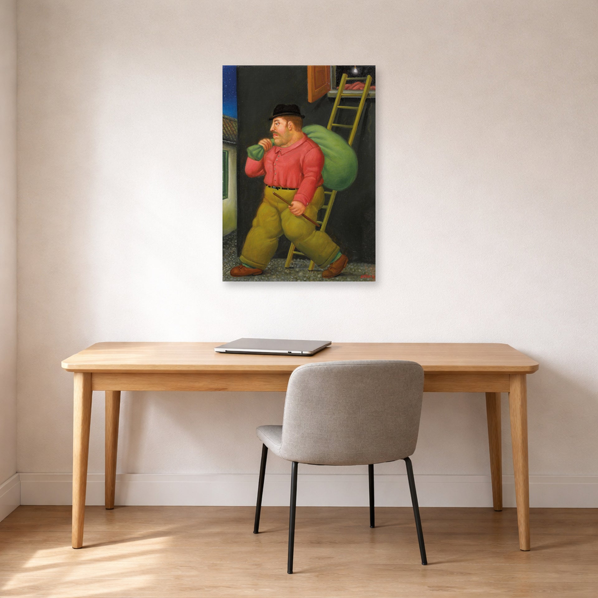 Unframed poster print of Fernando Botero's Un ladron (A thief) displayed on a wall in a home office