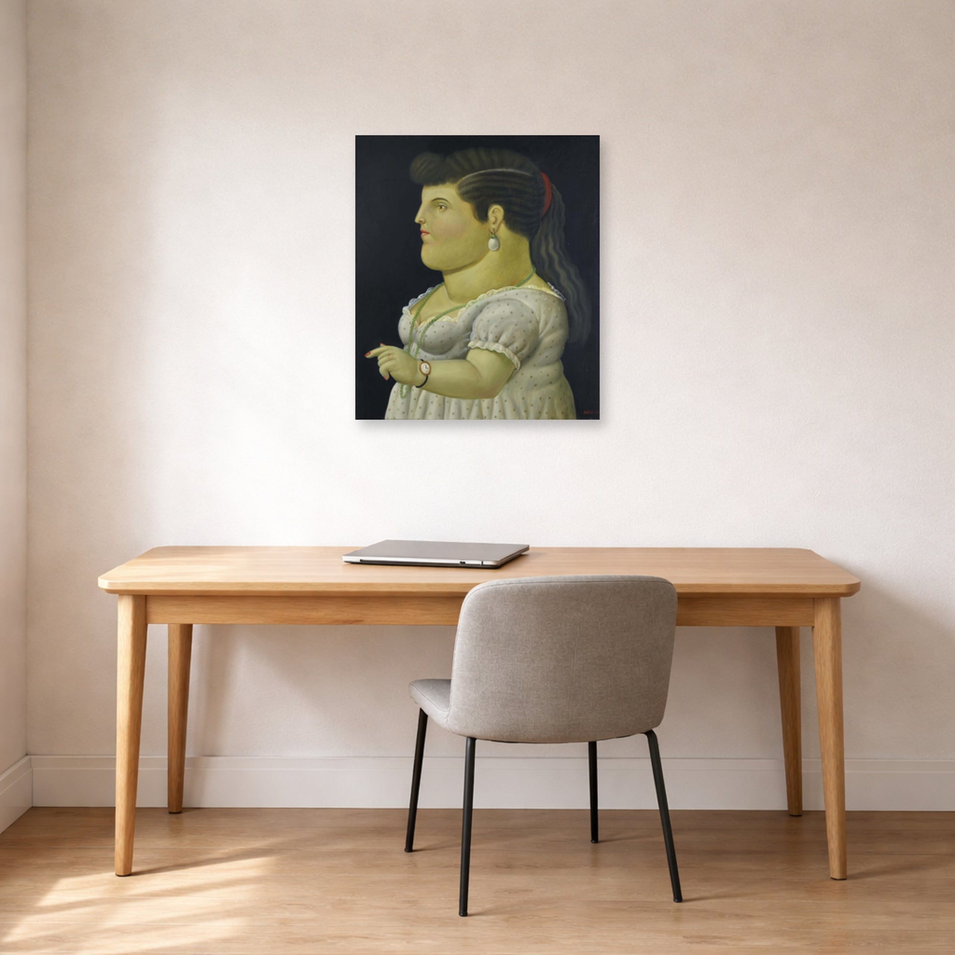 Unframed poster print of Fernando Botero's Woman in Profile displayed on a wall in a home office