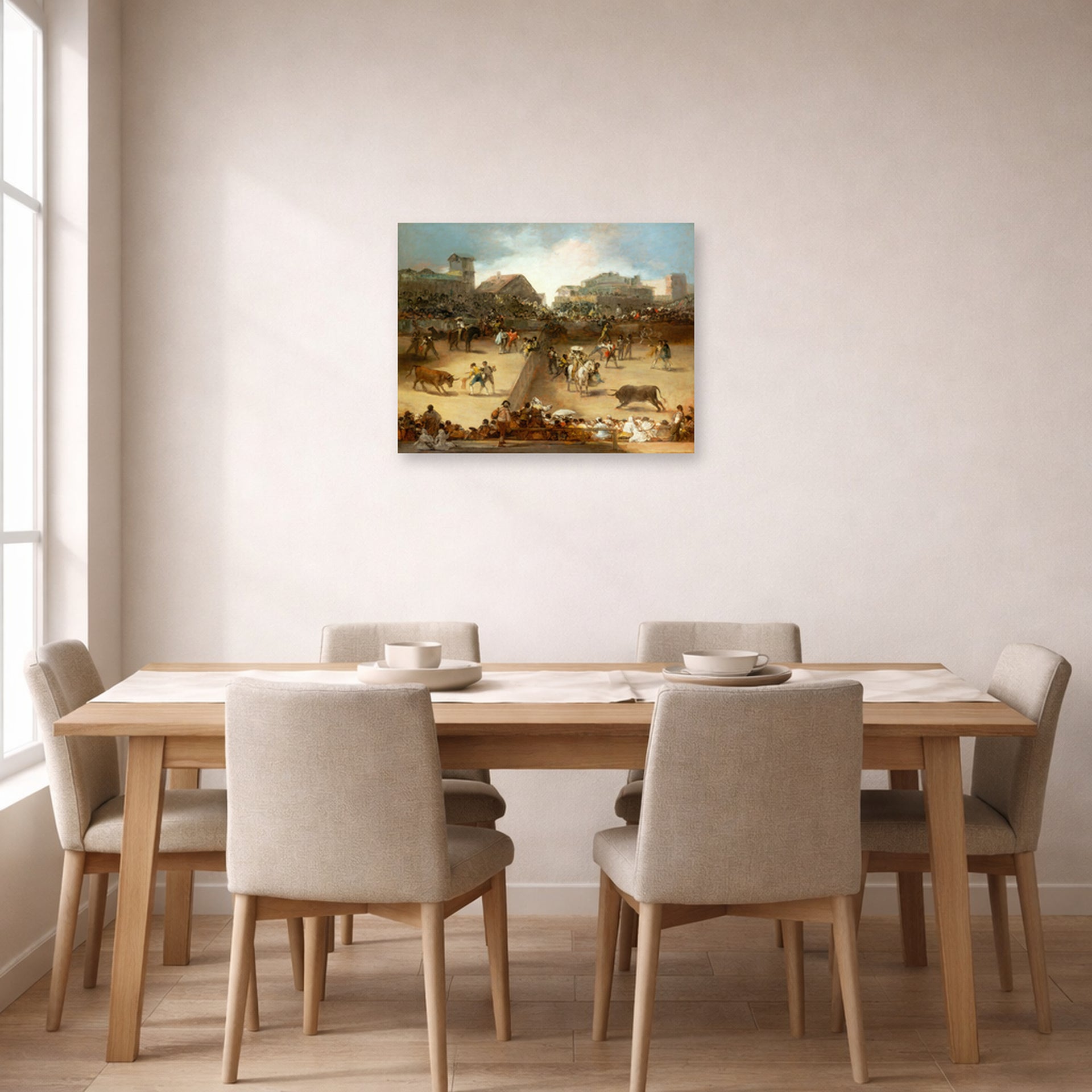 Unframed poster print of Francisco Goya's Bullfight in a Divided Ring displayed on a wall in a dining room