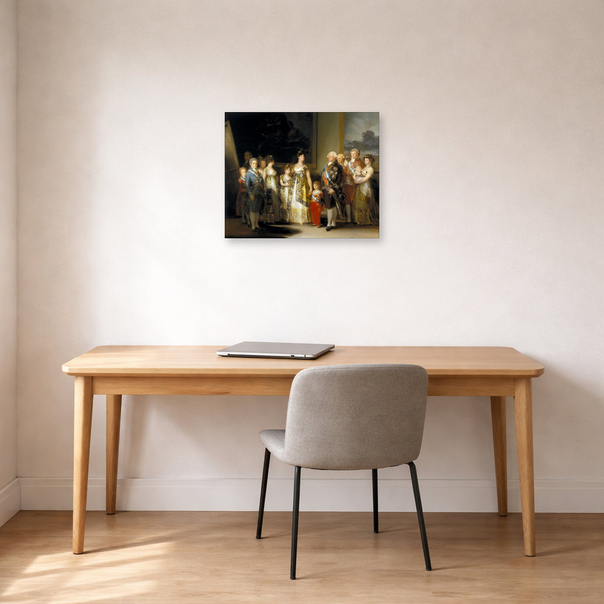 Unframed poster print of Francisco Goya's Charles IV of Spain and His Family displayed on a wall in a office