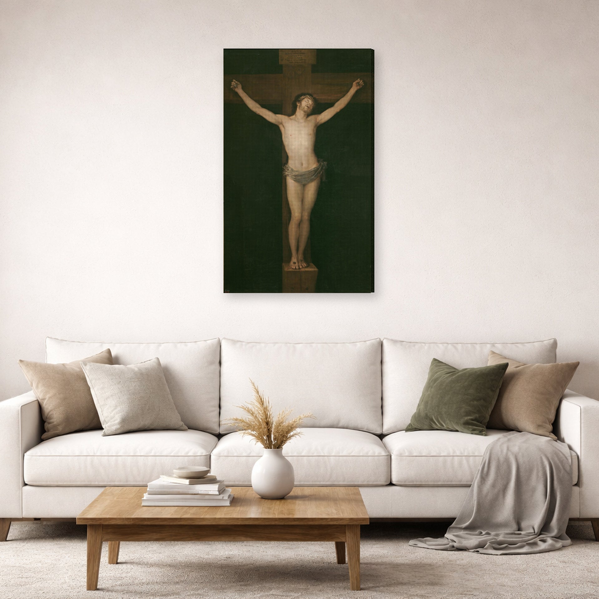 Gallery-wrapped canvas print of Francisco Goya's Christ Crucified displayed on a wall in a second living room setting