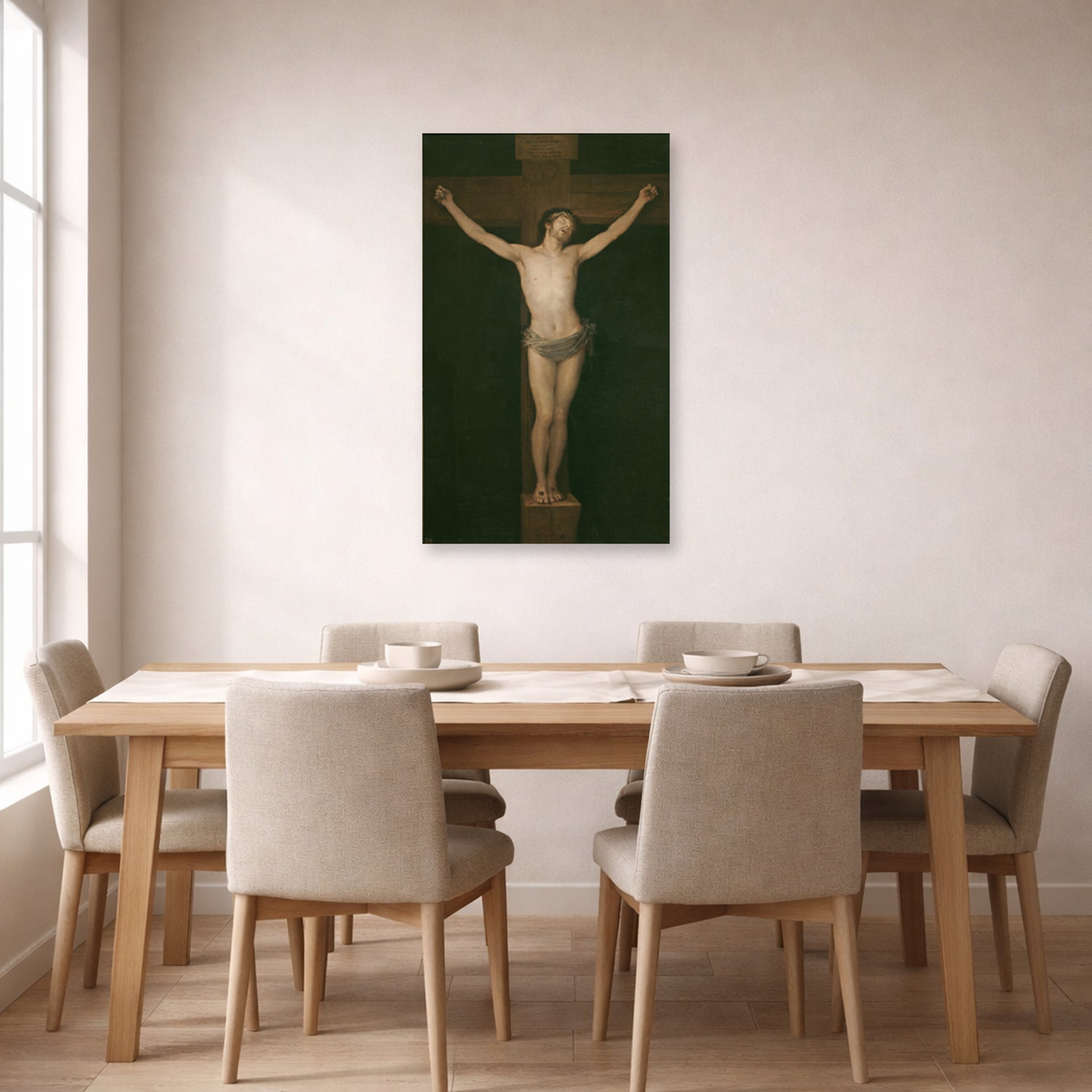 Unframed poster print of Francisco Goya's Christ Crucified displayed on a wall in a dining room