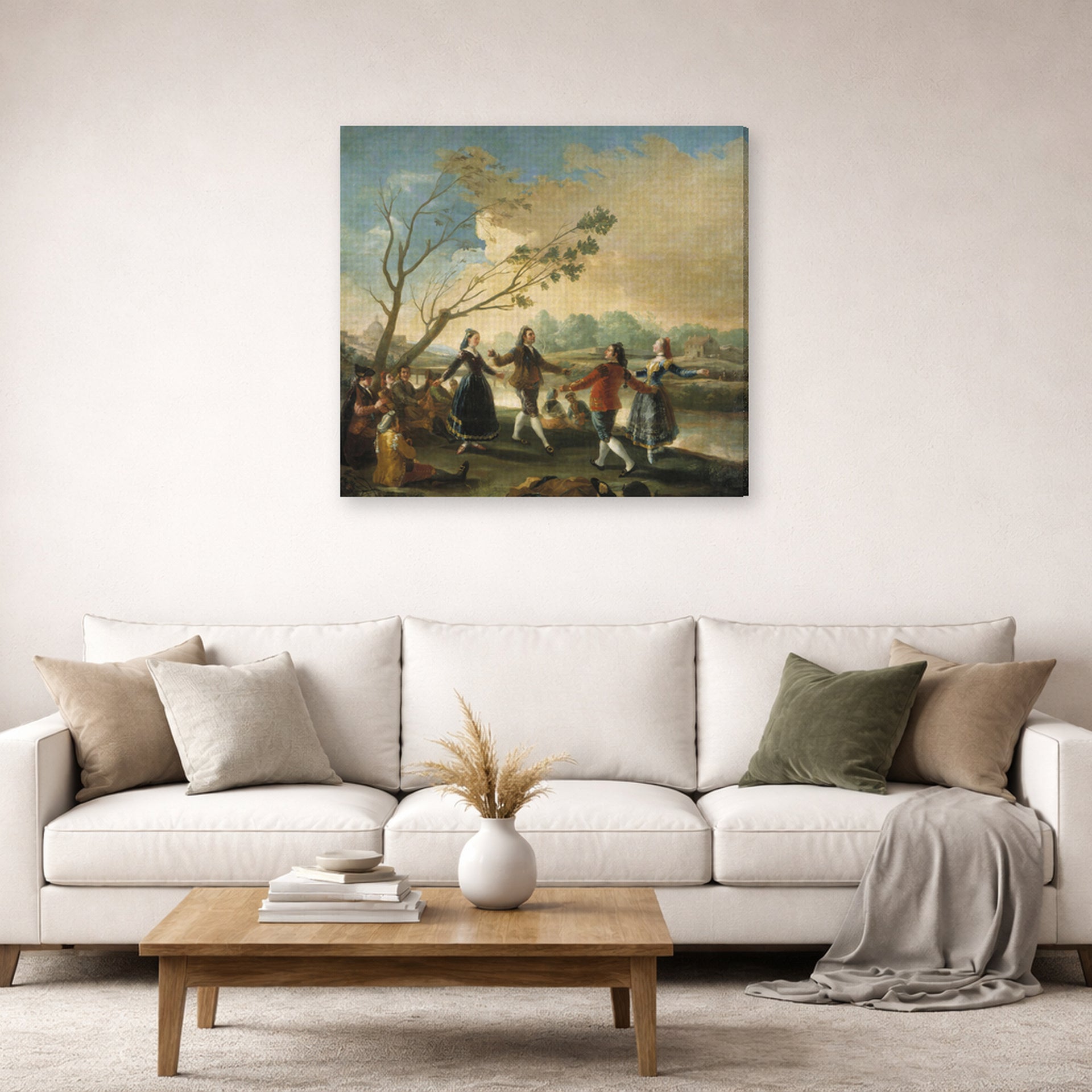 Gallery-wrapped canvas print of Francisco Goya's Dance of the Majos at the Banks of Manzanares displayed on a wall in a second living room setting