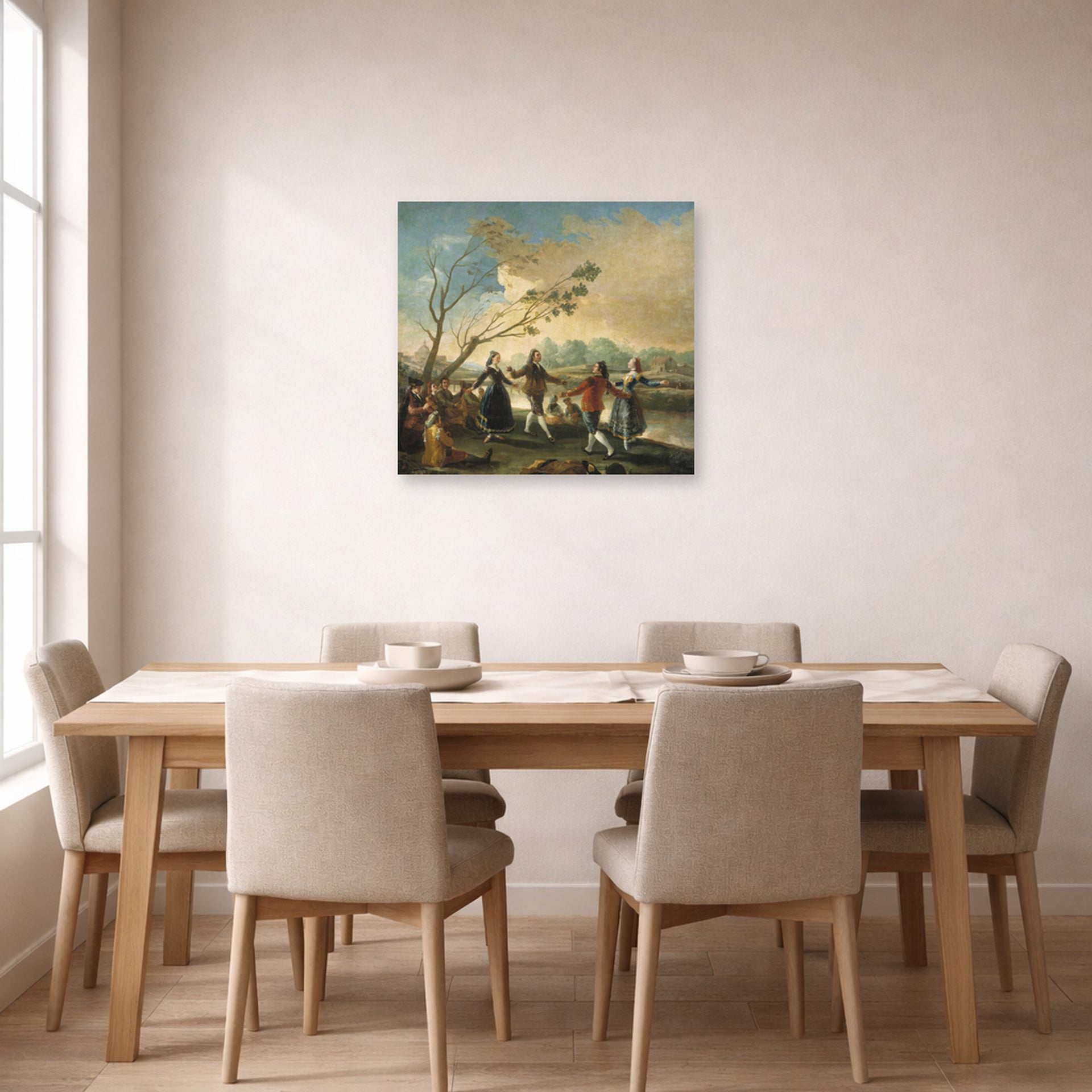 Unframed poster print of Francisco Goya's Dance of the Majos at the Banks of Manzanares displayed on a wall in a dining room