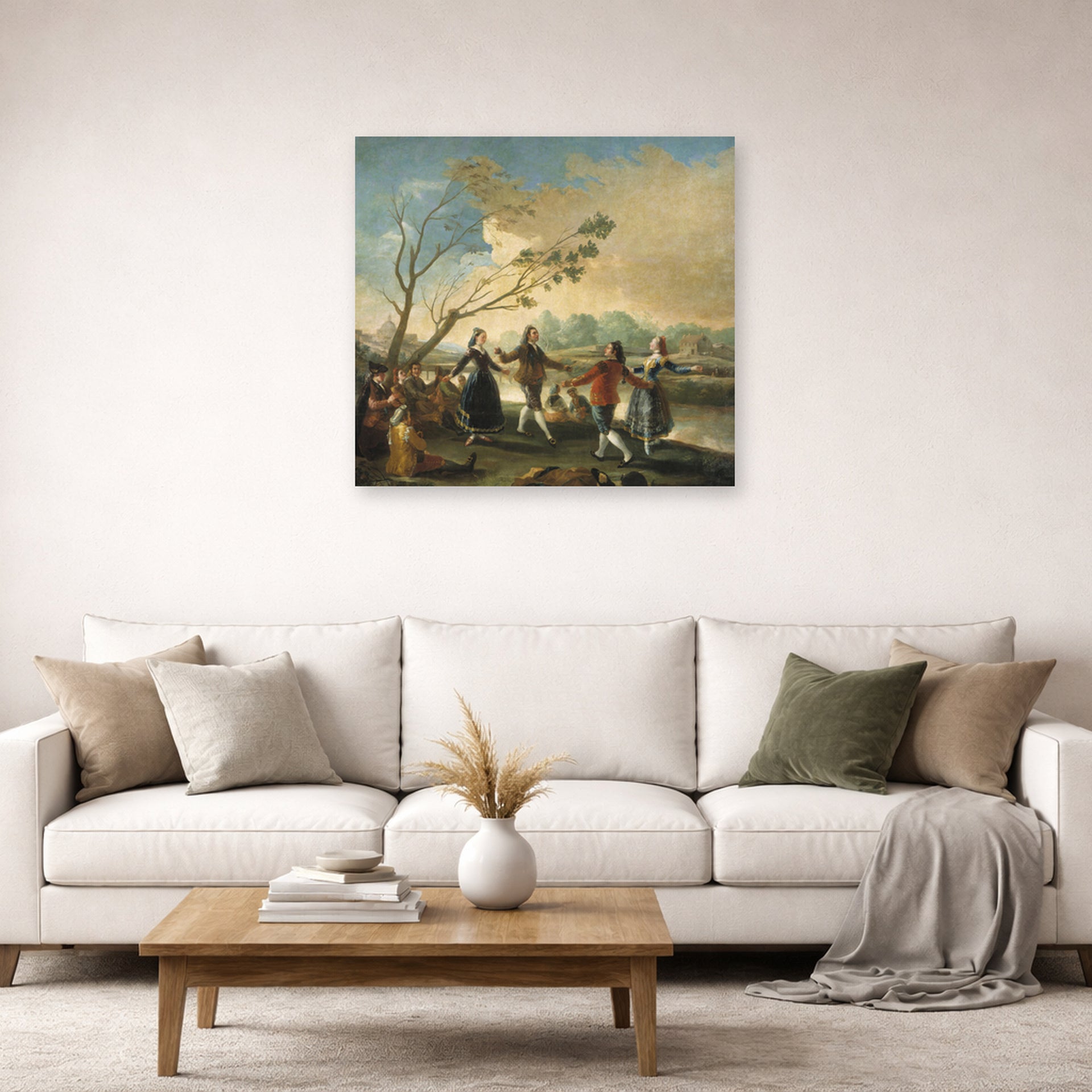 Unframed poster print of Francisco Goya's Dance of the Majos at the Banks of Manzanares displayed on a wall in a second living room setting