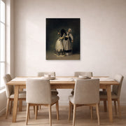 Unframed poster print of Francisco Goya's Duchess of Alba and la Beata displayed on a wall in a dining room
