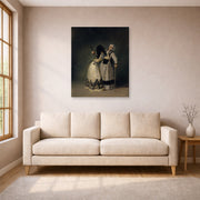 Unframed poster print of Francisco Goya's Duchess of Alba and la Beata displayed on a wall in a living room
