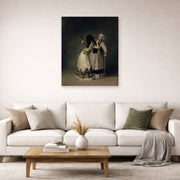 Unframed poster print of Francisco Goya's Duchess of Alba and la Beata displayed on a wall in a second living room setting