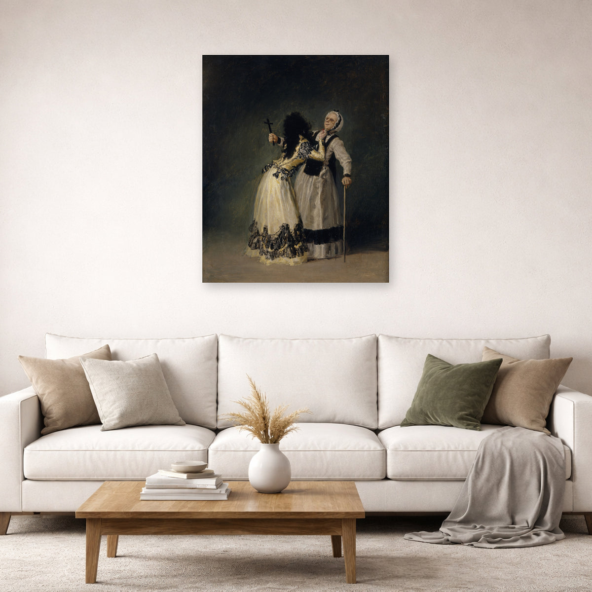 Unframed poster print of Francisco Goya's Duchess of Alba and la Beata displayed on a wall in a second living room setting