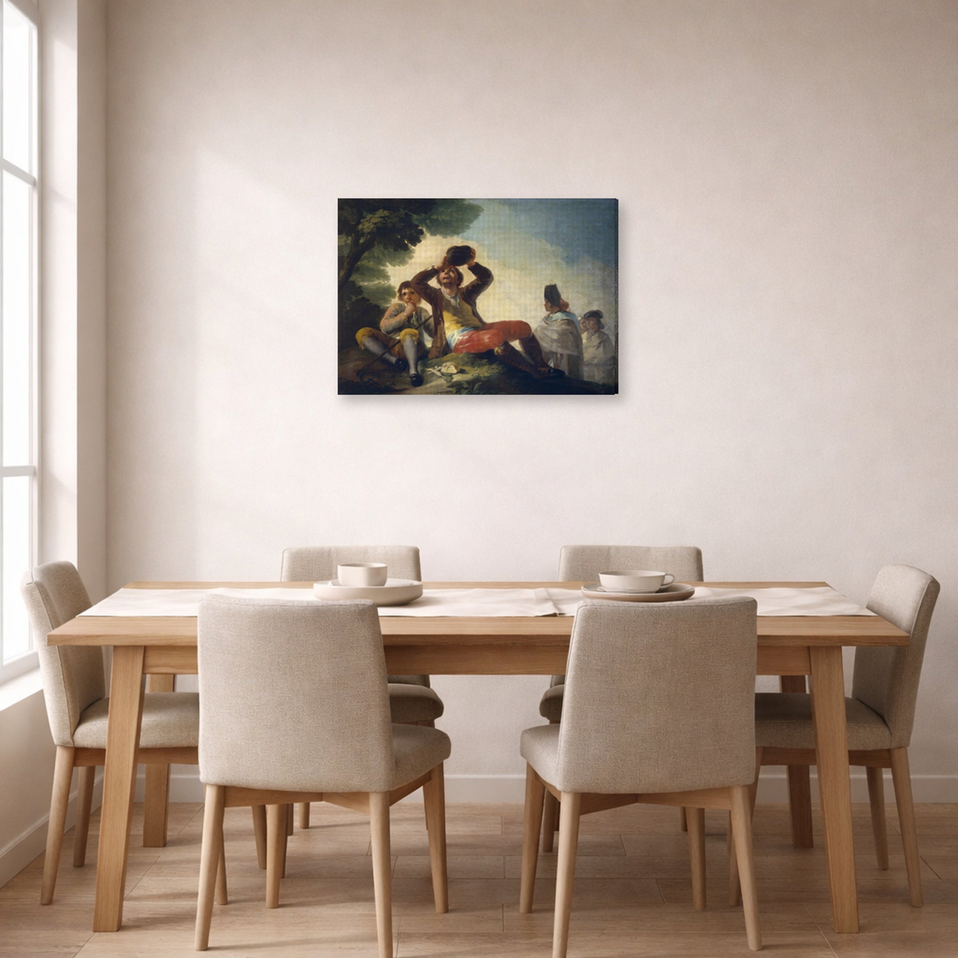 Gallery-wrapped canvas print of Francisco Goya's El Bebedor displayed on a wall in a dining room