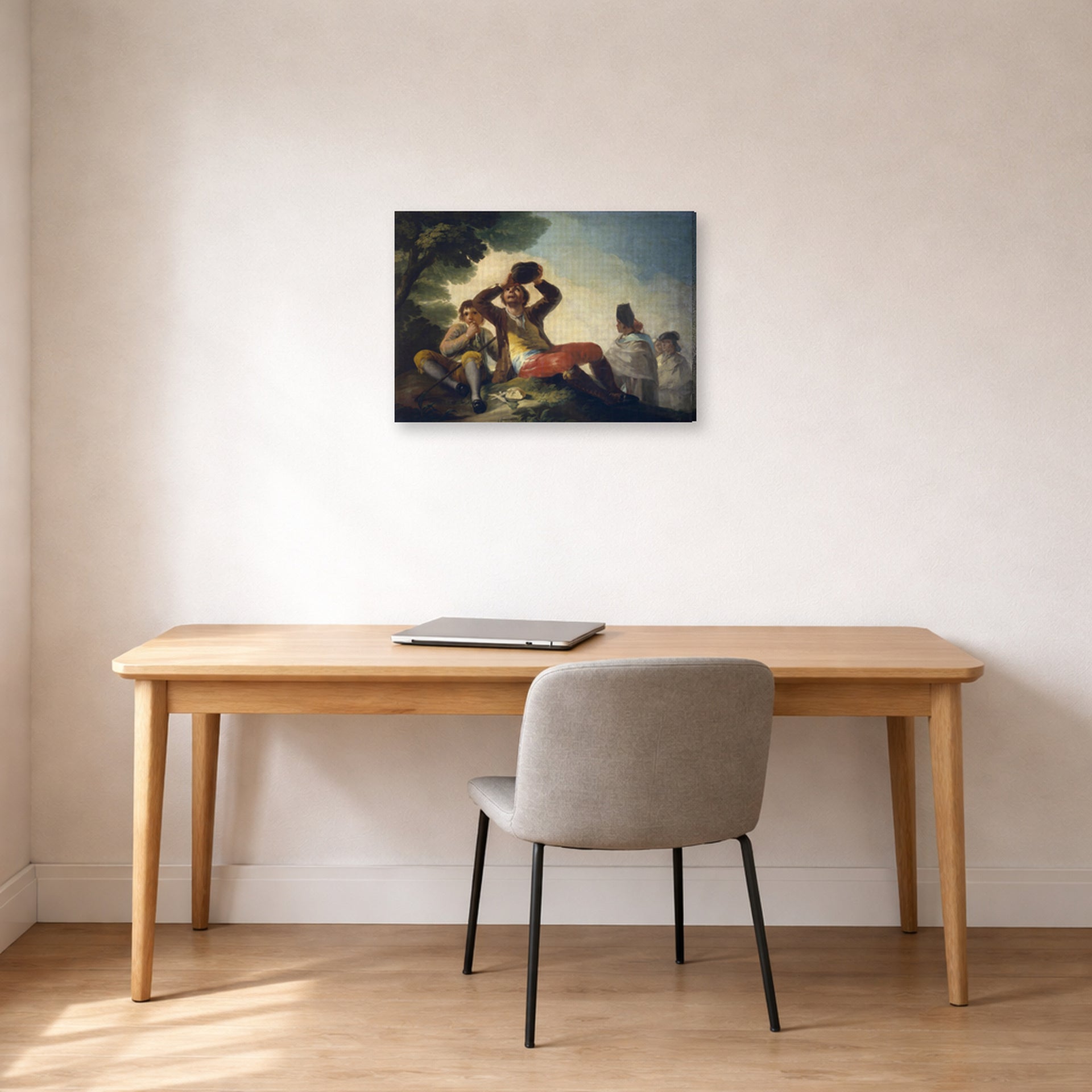 Gallery-wrapped canvas print of Francisco Goya's El Bebedor displayed on a wall in a office