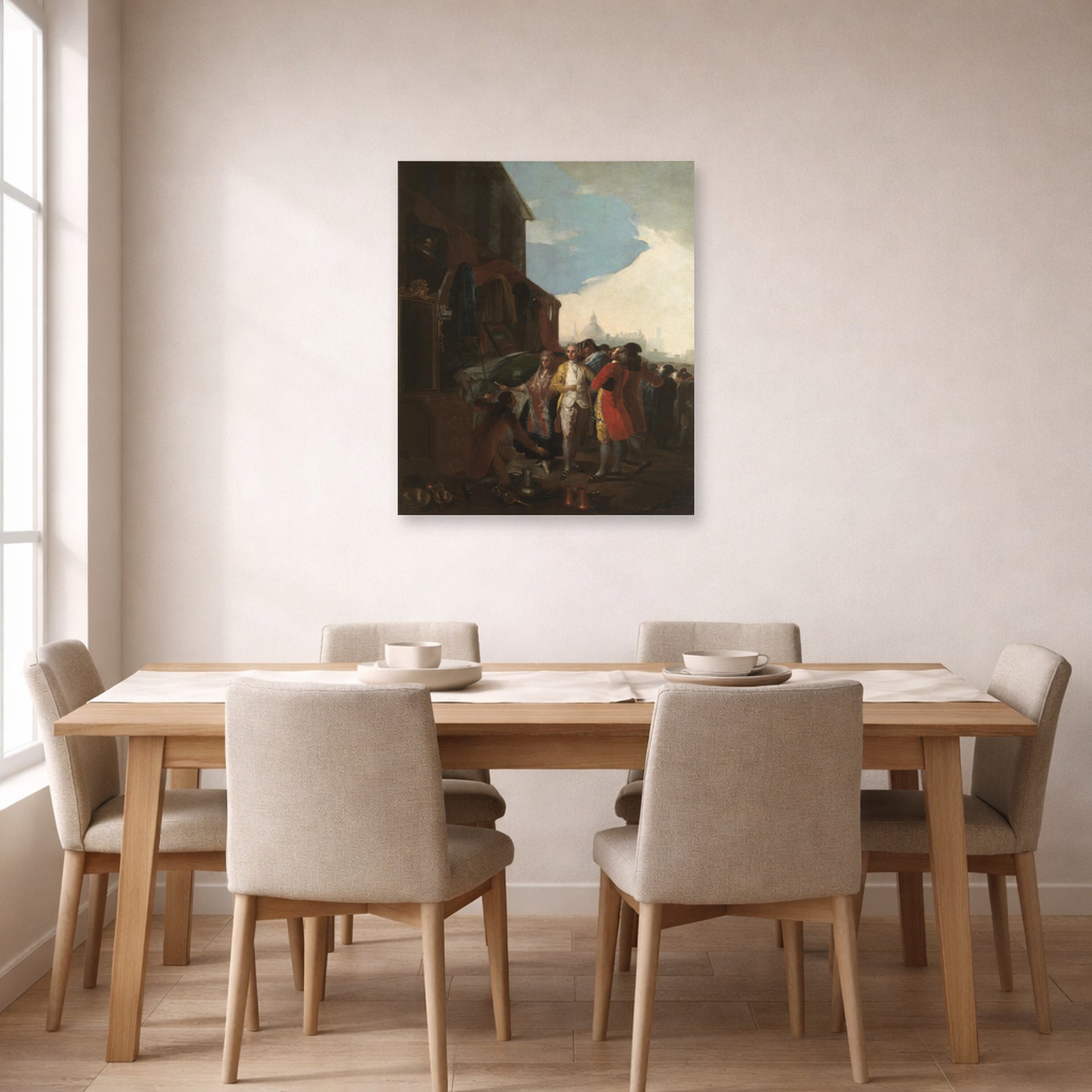 Unframed poster print of Francisco Goya's Fair Madrid displayed on a wall in a dining room