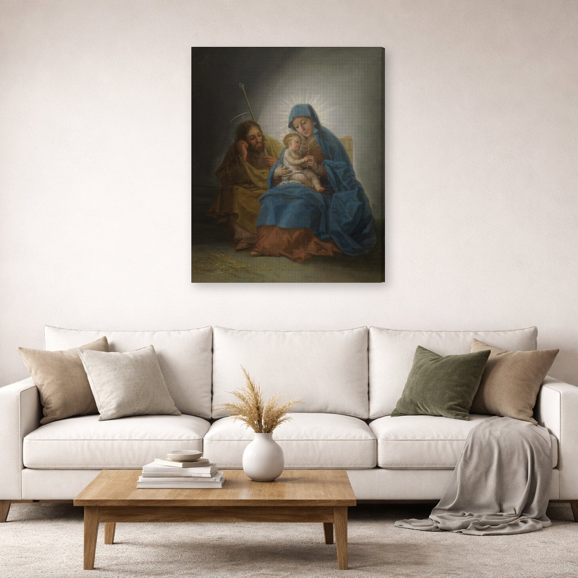 Gallery-wrapped canvas print of Francisco Goya's La Sagrada Familia displayed on a wall in a second living room setting