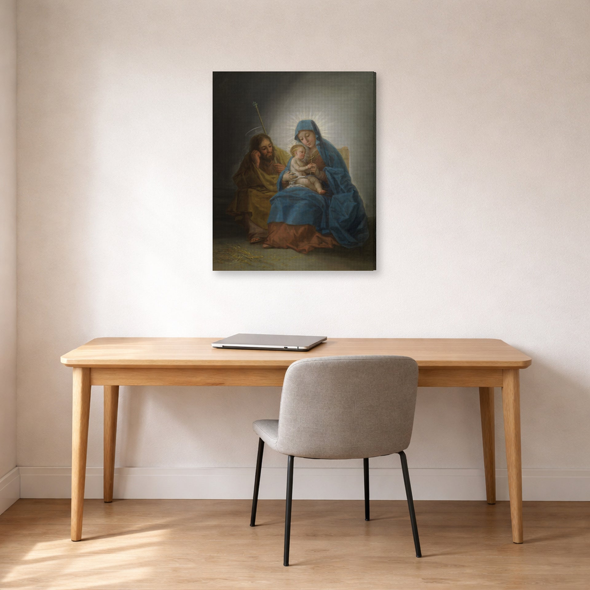 Gallery-wrapped canvas print of Francisco Goya's La Sagrada Familia displayed on a wall in a office