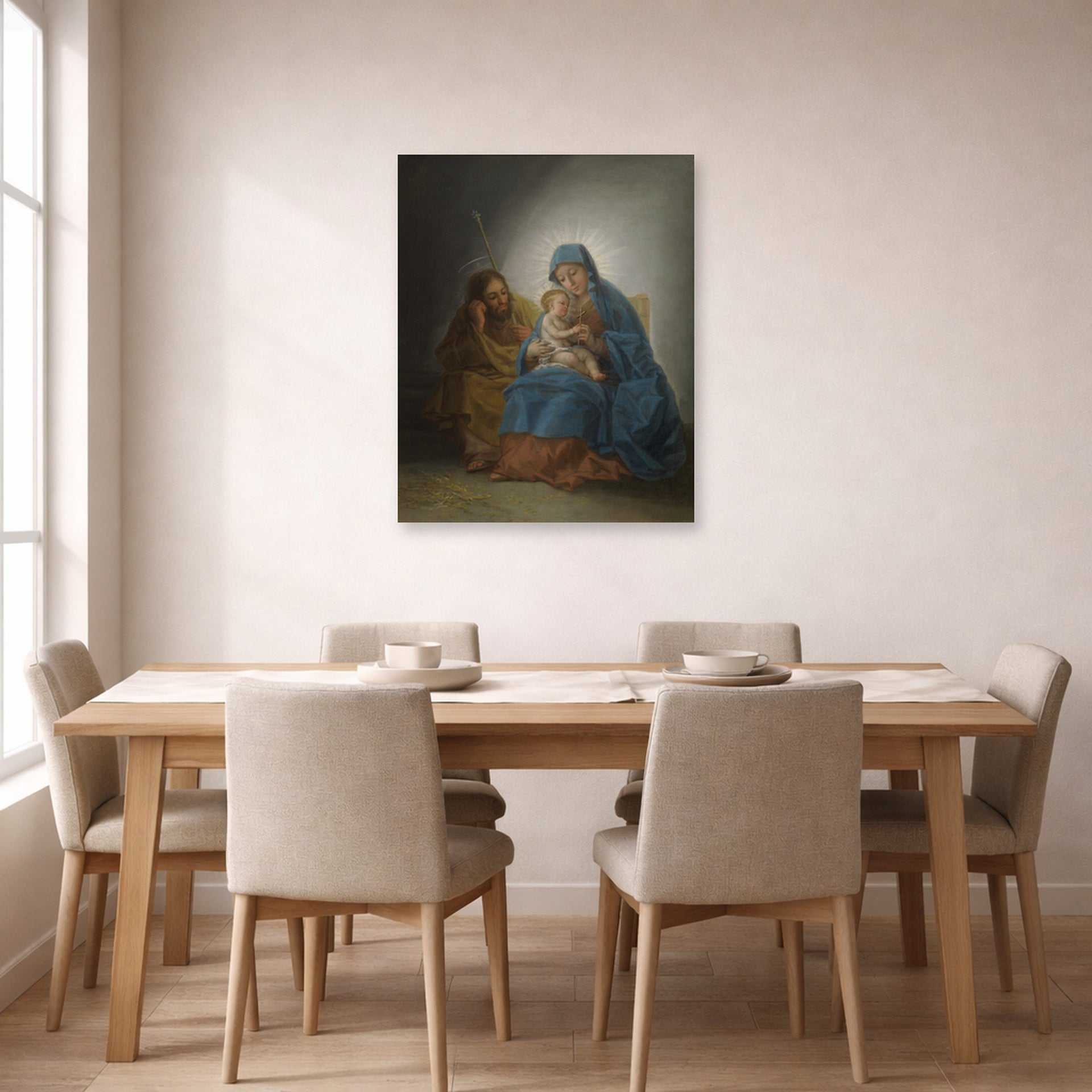 Unframed poster print of Francisco Goya's La Sagrada Familia displayed on a wall in a dining room