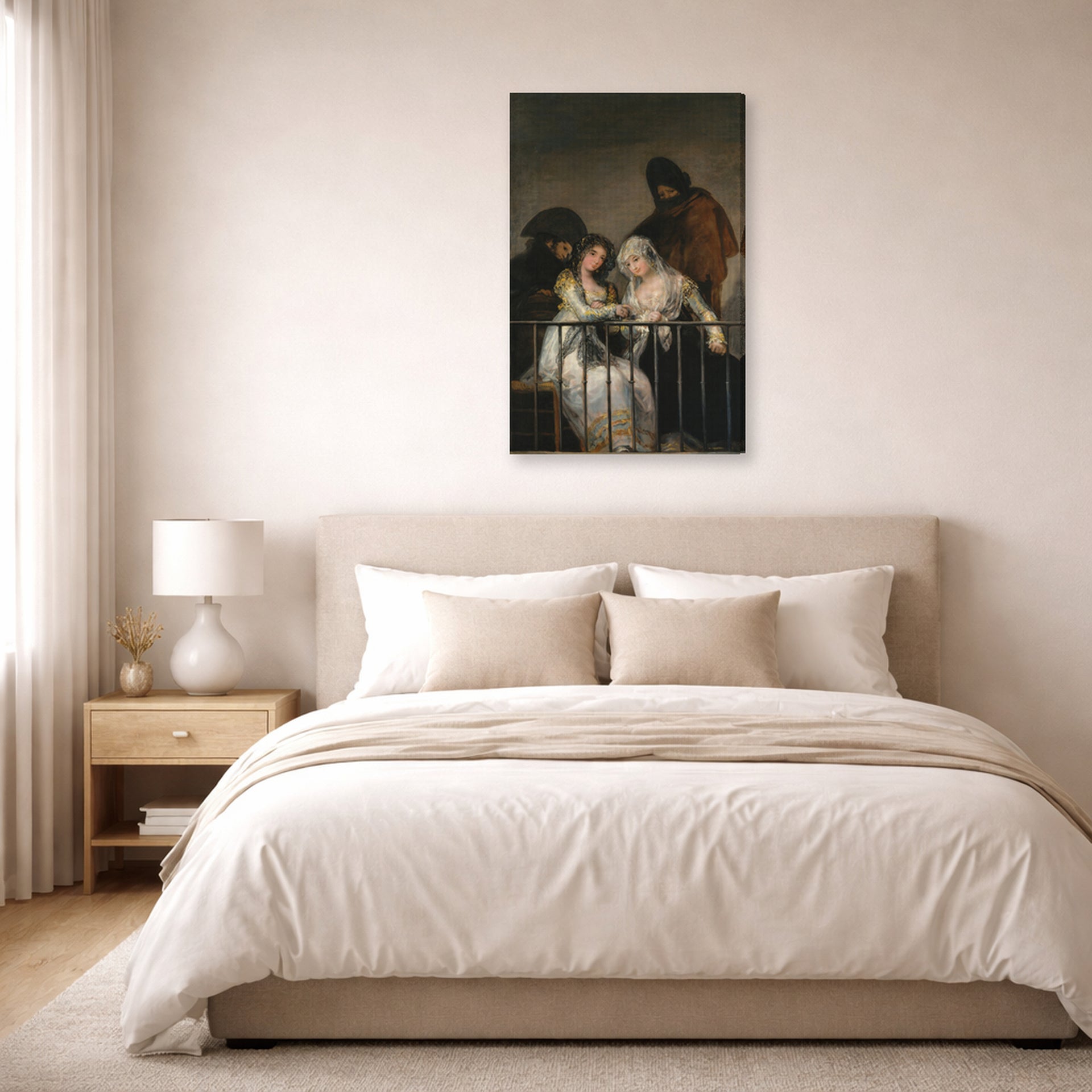 Gallery-wrapped canvas print of Francisco Goya's Majas on a Balcony displayed on a wall in a bedroom