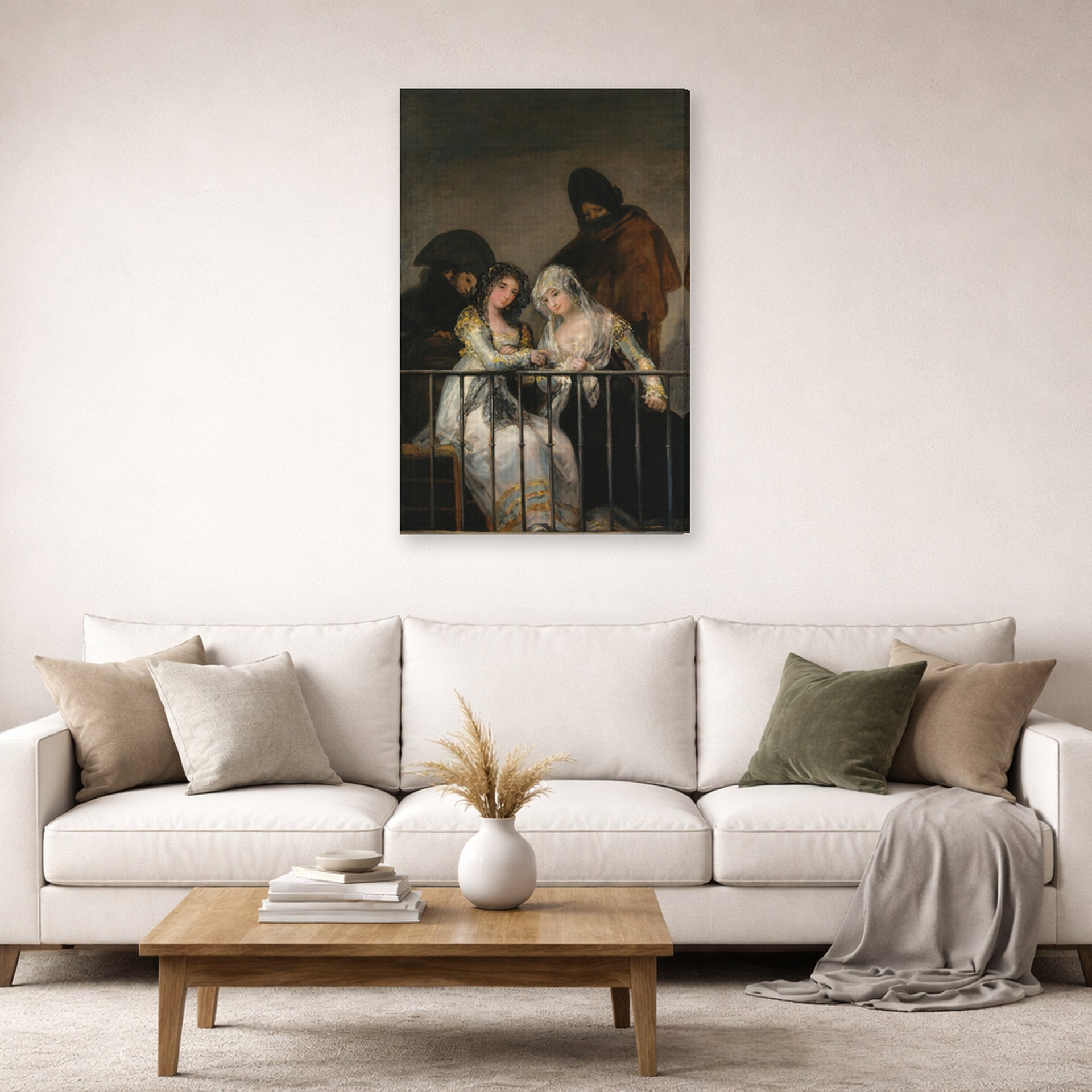 Gallery-wrapped canvas print of Francisco Goya's Majas on a Balcony displayed on a wall in a second living room setting