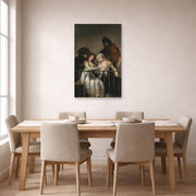 Unframed poster print of Francisco Goya's Majas on a Balcony displayed on a wall in a dining room