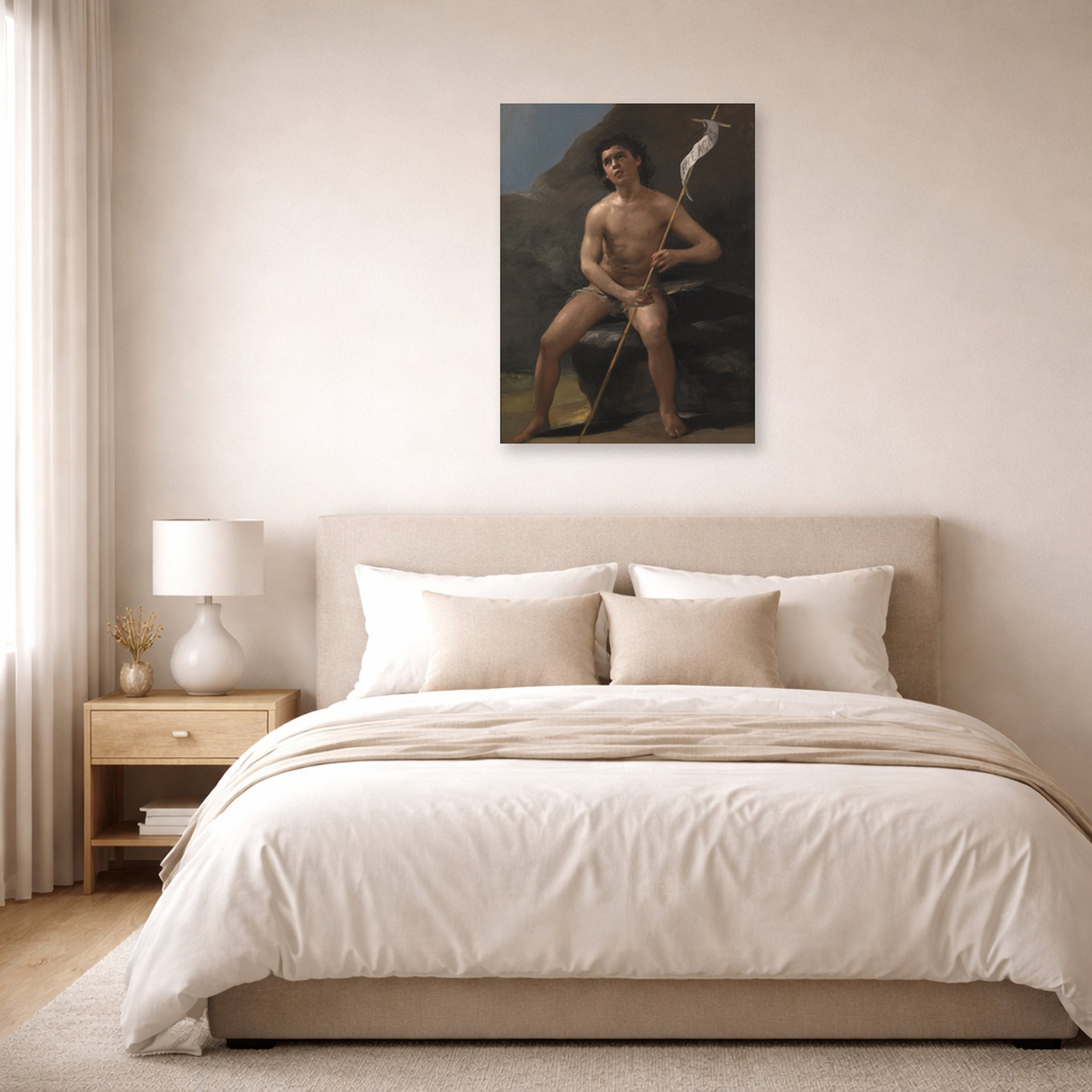 Unframed poster print of Francisco Goya's Saint John the Baptist as a Child in the Desert displayed on a wall in a bedroom