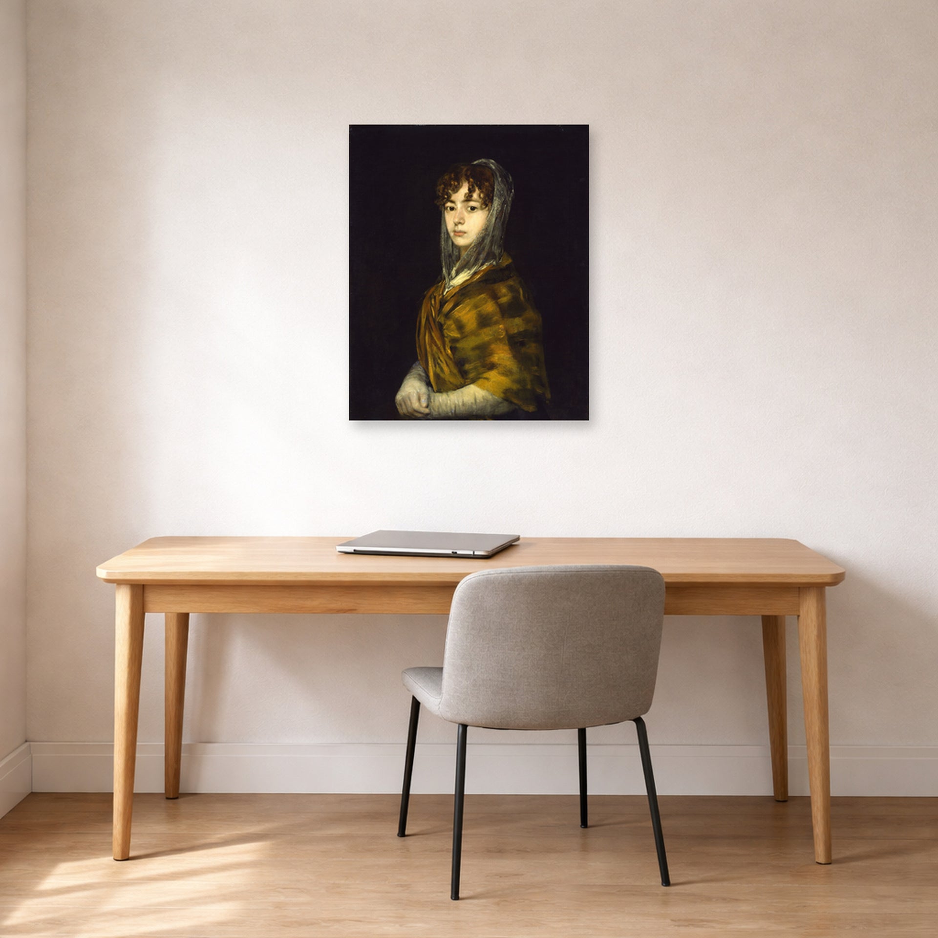 Unframed poster print of Francisco Goya's Senora Sabasa Garcia displayed on a wall in a office
