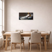 Unframed poster print of Francisco Goya's The Clothed Maja (La maja vestida) displayed on a wall in a dining room