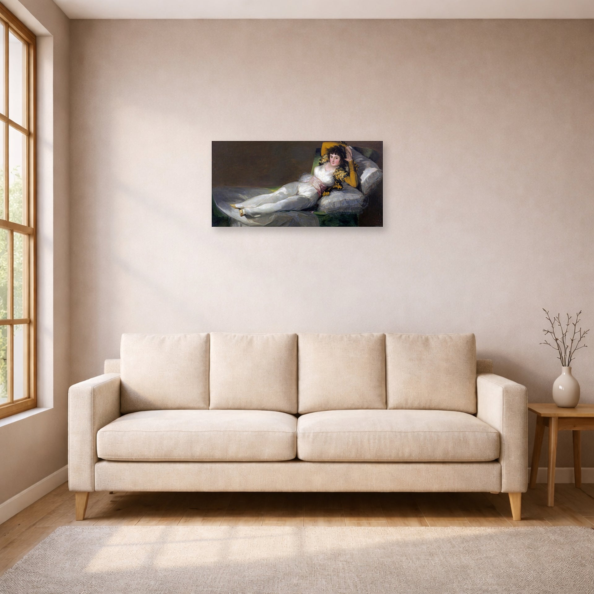 Unframed poster print of Francisco Goya's The Clothed Maja (La maja vestida) displayed on a wall in a living room