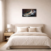 Gallery-wrapped canvas print of Francisco Goya's The Nude Maja (La Maja Desnuda) displayed on a wall in a bedroom