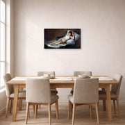Gallery-wrapped canvas print of Francisco Goya's The Nude Maja (La Maja Desnuda) displayed on a wall in a dining room