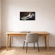Gallery-wrapped canvas print of Francisco Goya's The Nude Maja (La Maja Desnuda) displayed on a wall in a office
