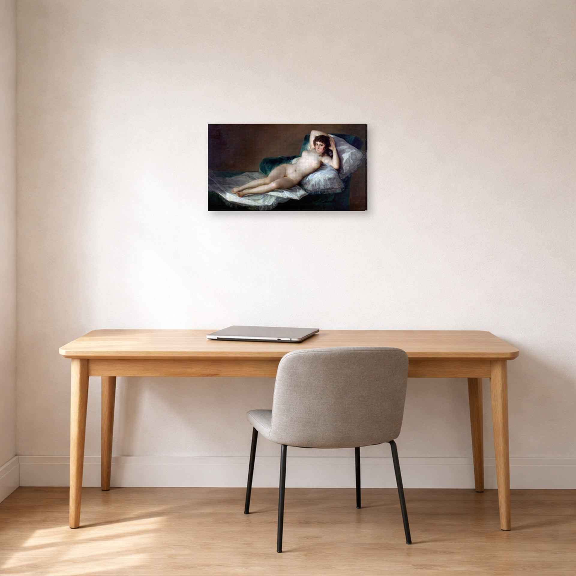 Gallery-wrapped canvas print of Francisco Goya's The Nude Maja (La Maja Desnuda) displayed on a wall in a office
